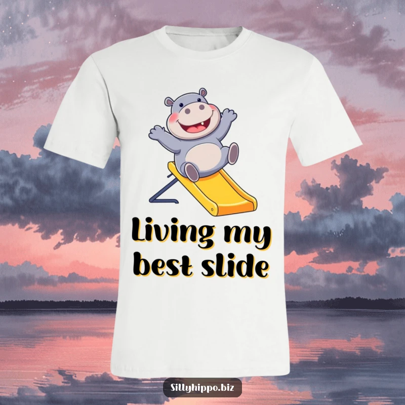 Funny t-shirt featuring a laughing hippo gleefully sliding down a colorful office slide, expressing pure delight and playful mischief.