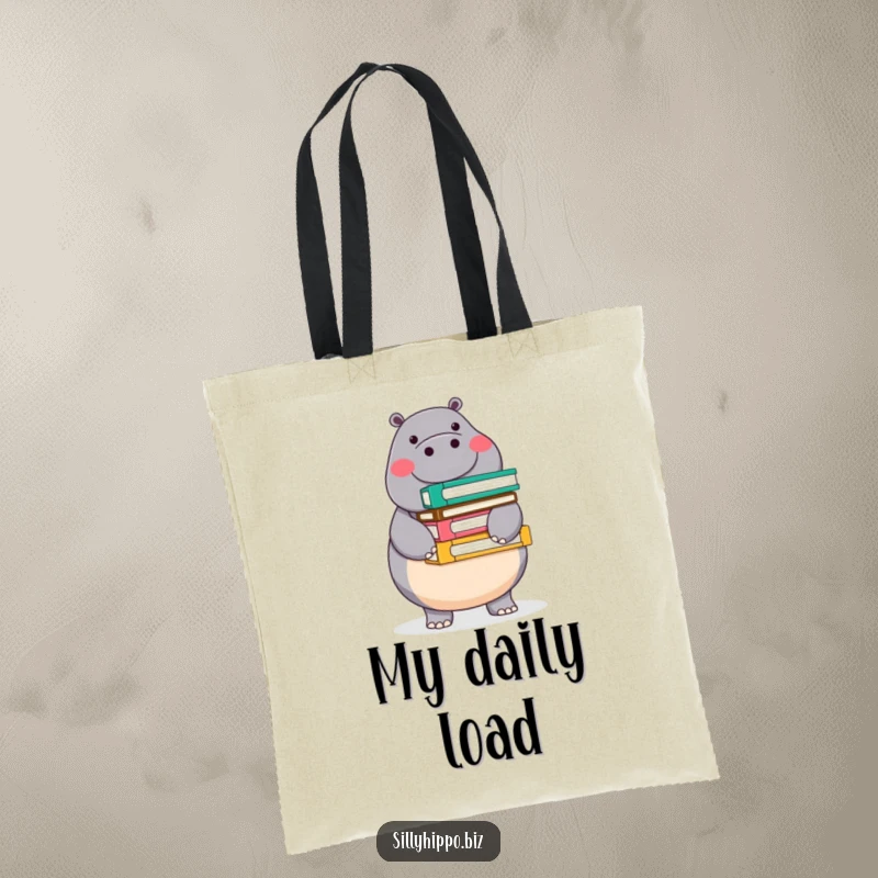 Funny tote bag showcasing a round, cheerful hippo expertly balancing a stack of colorful office folders, perfect for carrying items with organized humor.